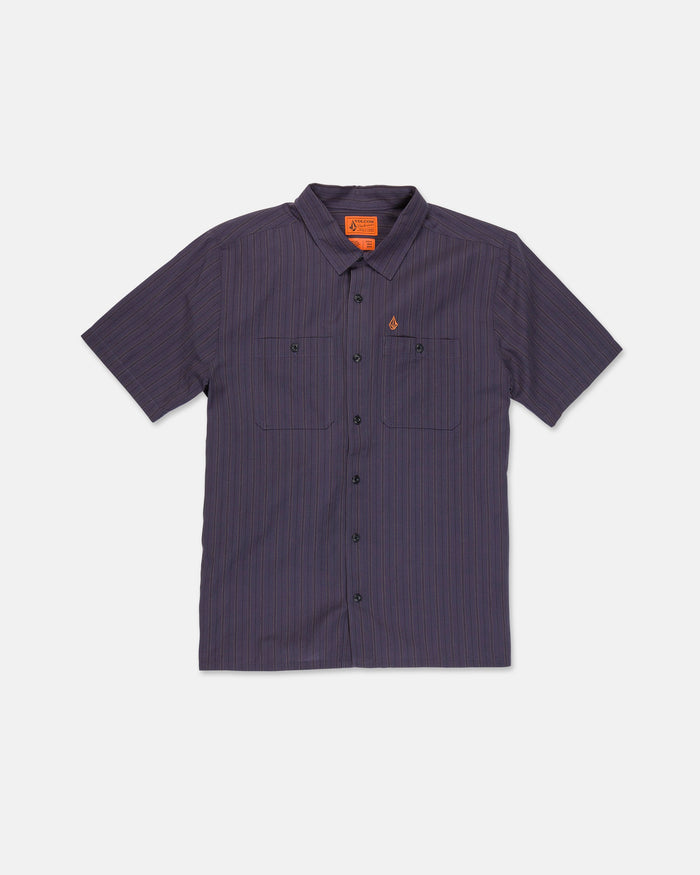 Displayed on a white background, the Men's Kap Out Workwear Short Sleeve Shirt by Volcom features short sleeves, a button-up front, a dark pinstripe pattern, two front pockets, and an orange logo patch above the left pocket for added detail.