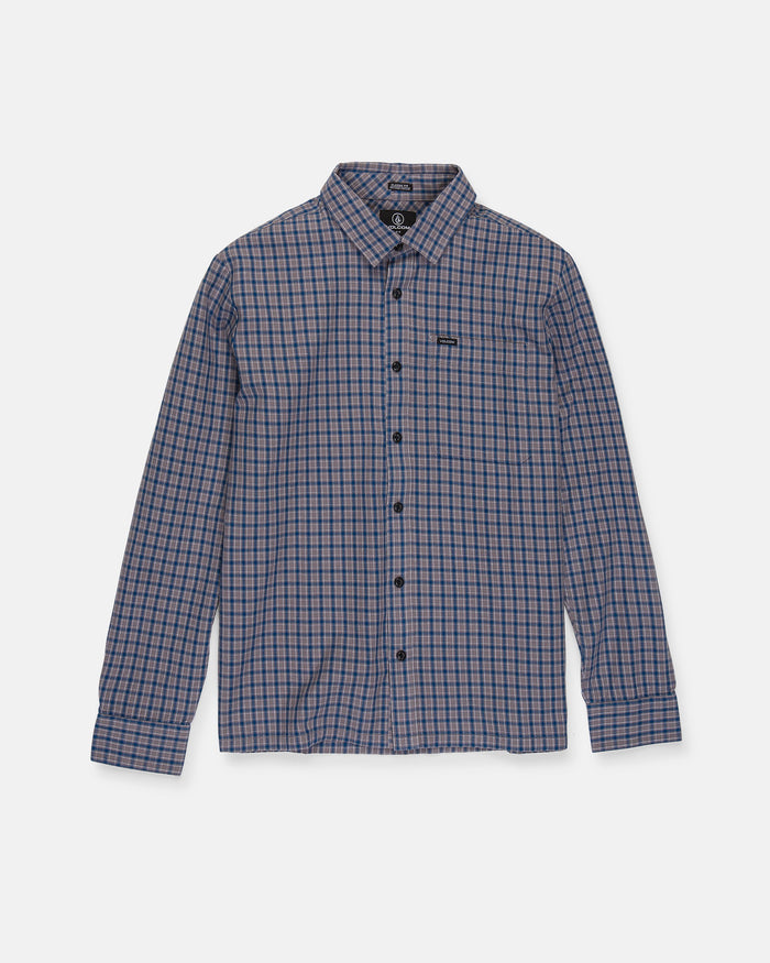 The Men's Landos Long Sleeve Shirt by Volcom is a relaxed, boxy-fit button-up featuring a blue, white, and red yarn-dyed plaid pattern and an oversized chest pocket, shown laid flat on a white background.