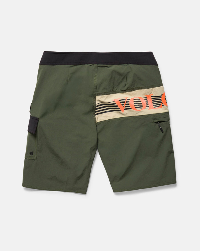 Back view of Volcom Men's Liberator Mod green 20" cargo shorts with black waistband, 4-way stretch nylon, left button-flap side pocket, right zip pocket, and beige/orange graphic with partial VOLC logo on the back.