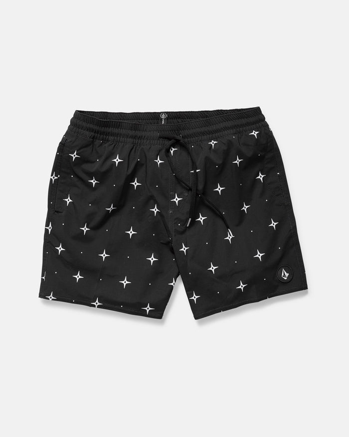 The Volcom Men's Lido Print 16" Trunk features an elastic waistband, white drawstring, scattered white star pattern, 4-way stretch fabric, and a logo patch on the left leg. Shorts are laid flat on a plain background.