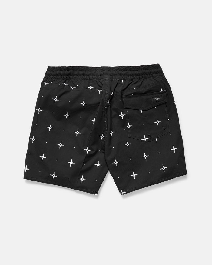 The Men's Lido Print 16" Trunk by Volcom features a white star pattern, 4-way stretch fabric, elastic waistband, and a back pocket with a small rectangular label. Shorts are displayed flat on a white background.