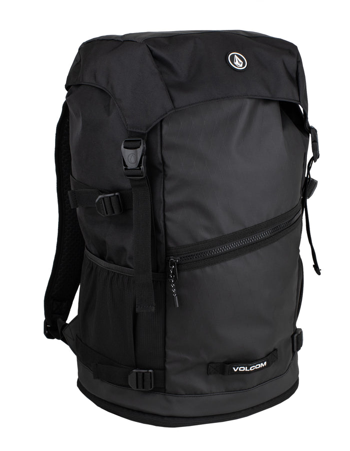 The Volcom Men's Litestone Gear Pack is a durable backpack with multiple compartments, side mesh pockets, adjustable straps, and a zippered front pocket, shown on a white background.