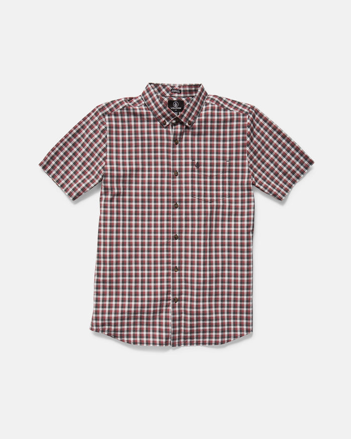 The Volcom Men's Louie Check Short Sleeve Tee features a red, white, and black plaid pattern with hints of light blue acid check, shown on a plain white background.