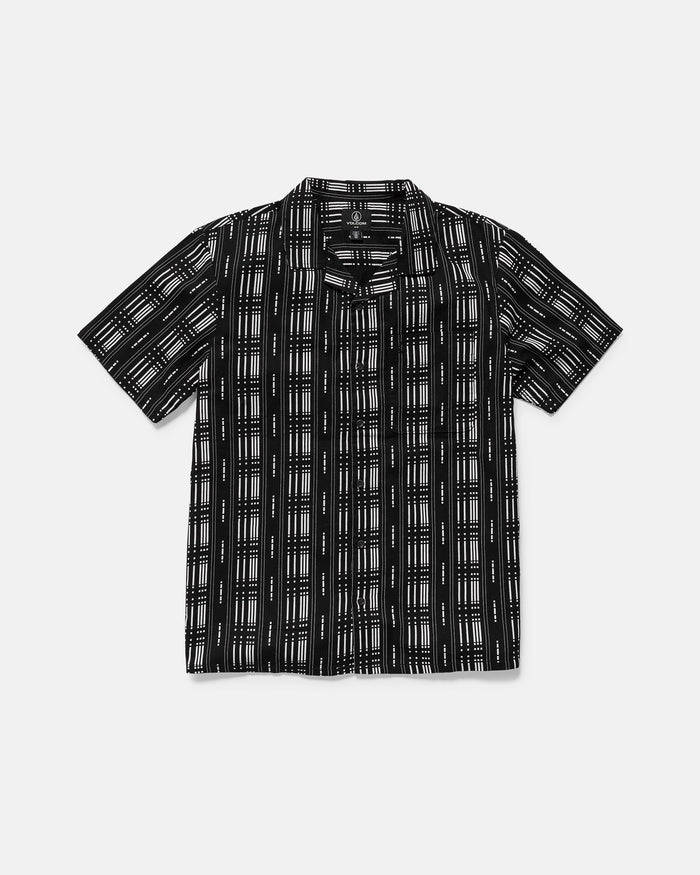 The Volcom Men's Macros Short Sleeve Tee, featuring a black allover print and white checkered plaid on cotton herringbone fabric with a boxy fit, is shown against a plain white background.