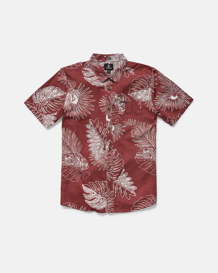 The Volcom Men's Monsterious Short Sleeve Shirt features a button-up design, collar, chest pocket, and white tropical leaf print on burgundy, made from a comfy cotton-viscose blend.