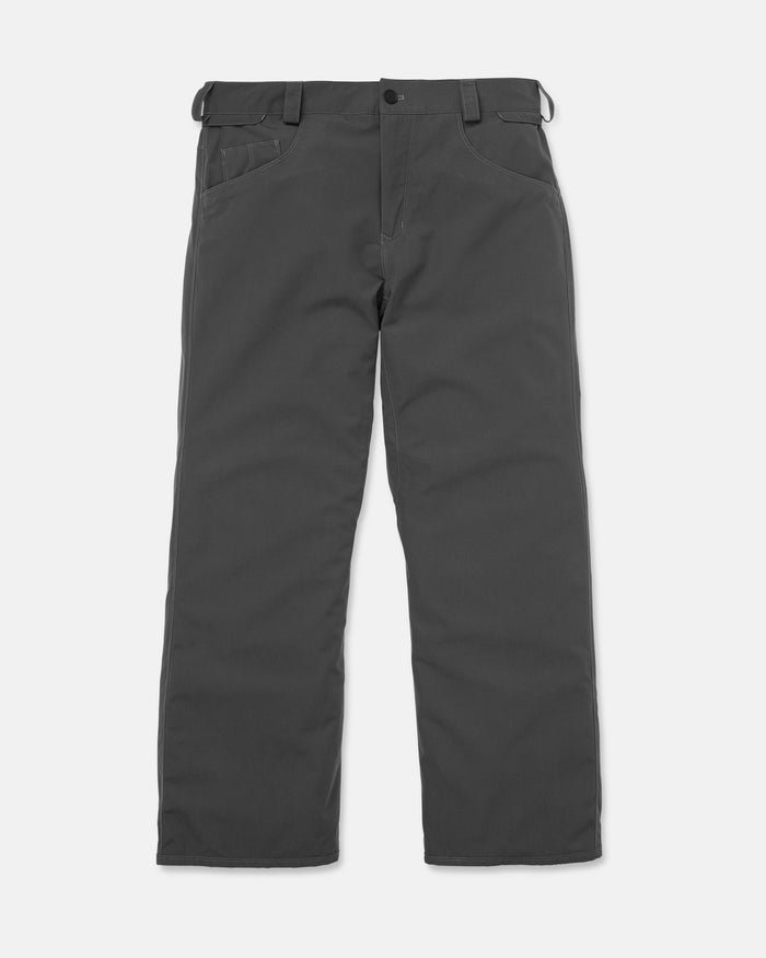The Volcom Men’s Nailer Pants, shown in dark gray on a white background, feature a straight-leg cut, recycled fabric construction, belt loops, front and back pockets, and a button closure.