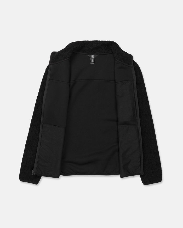 The Volcom Men’s Nelson Sherpa Full Zip jacket is shown laid flat and open against a plain white background, highlighting its soft sherpa interior lining, full zip closure, and practical pockets. The sleeves are spread slightly to the sides for display.