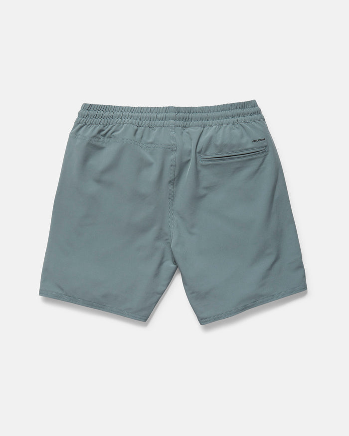 Back view of Volcom Men's Nomoly Elastic Waist Shorts 18" in light blue, featuring a right zippered pocket. Made from smooth, lightweight recycled polyester with 4-way stretch for extra comfort.