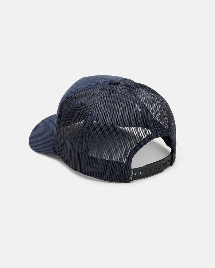 A Volcom Men's Overdrive Trucker is shown from the back in navy blue, featuring a breathable corduroy mesh design, an adjustable snapback closure, and a curved brim, all set against a plain white background.