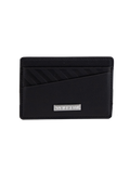 The Volcom Men's Primo Dos Cardholder features a sleek black design with diagonal textured lines on the top left and is accented by a silver metal plate engraved with "VOLCOM" at the bottom center, displayed against a plain white background.