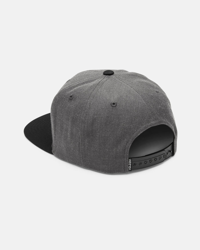 The Men's Quarter Evo Twill hat by Volcom is made from soft cotton twill fabric and features a gray crown paired with a black brim. Shown from the back, the snapback cap displays its adjustable strap and top button, all set against a clean white background.