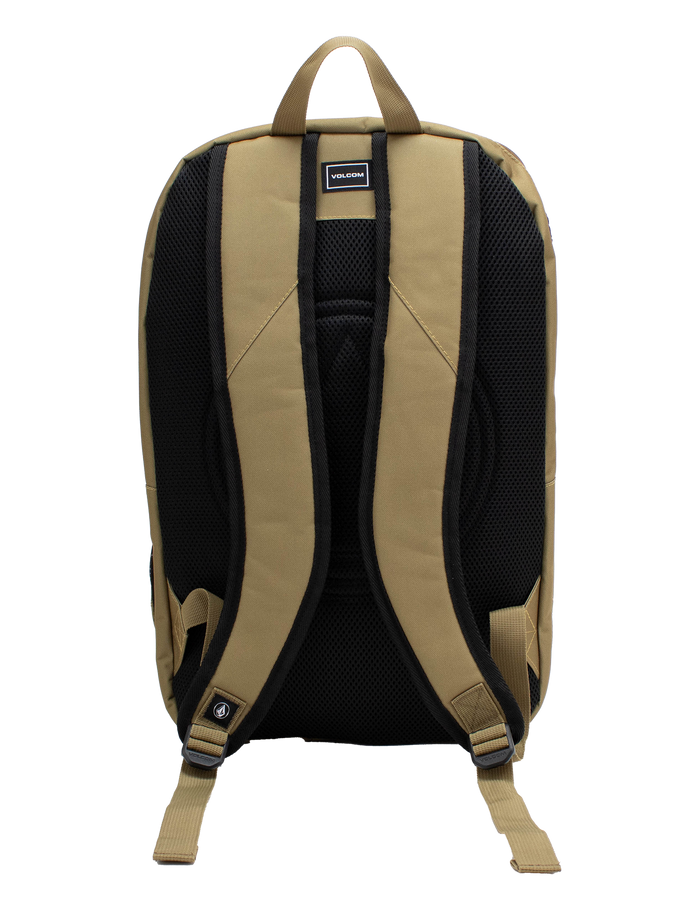 Tan and black Volcom Men's Roamer 3 Backpack shown from the back, featuring padded shoulder straps, a top handle, a mesh back panel, padded laptop sleeve, and a visible brand label near the top.