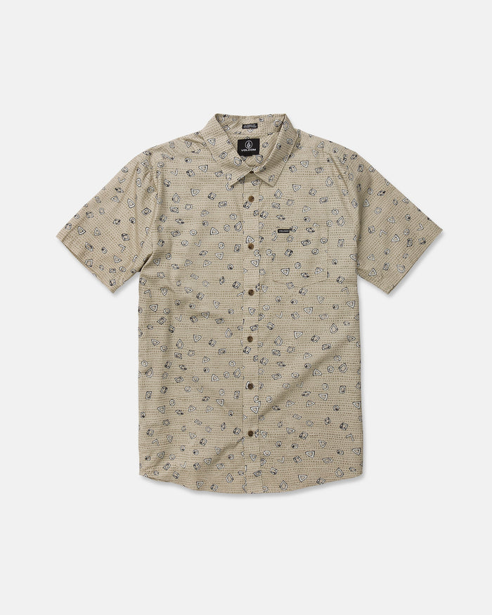 The Men’s Scaler Stone Short Sleeve Shirt by Volcom is a beige, classic-fit shirt featuring short sleeves and a subtle all-over print of small black geometric shapes. Made from a comfortable cotton-viscose blend, it includes a front pocket on the left chest adorned with a small black Volcom logo tag. The shirt is displayed laid flat on a white background.