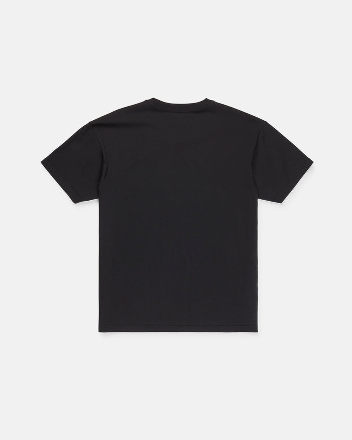 The Volcom Men's Scratch Stone Short Sleeve Tee, a plain black loose fit shirt crafted from heavyweight ringspun cotton, is laid flat with the back facing up on a white background.