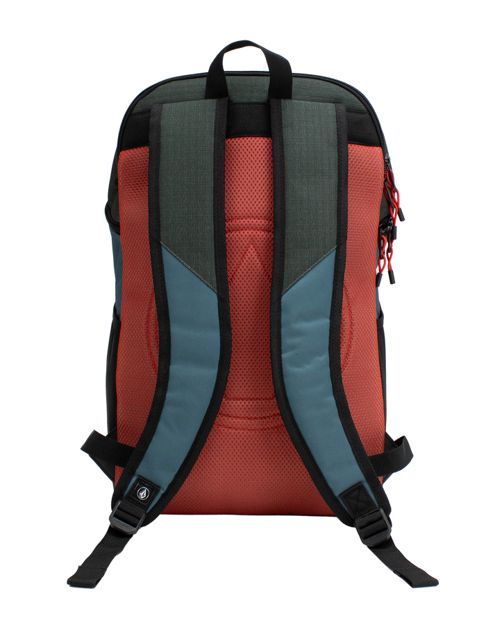 The Volcom Men's Slam School Backpack is displayed from the back, featuring red padded straps, teal blue side panels, and a black top handle. The zippers are accented with red pull tabs. Designed for functionality, this backpack includes a spacious main compartment and a padded laptop sleeve to keep essentials organized and protected.