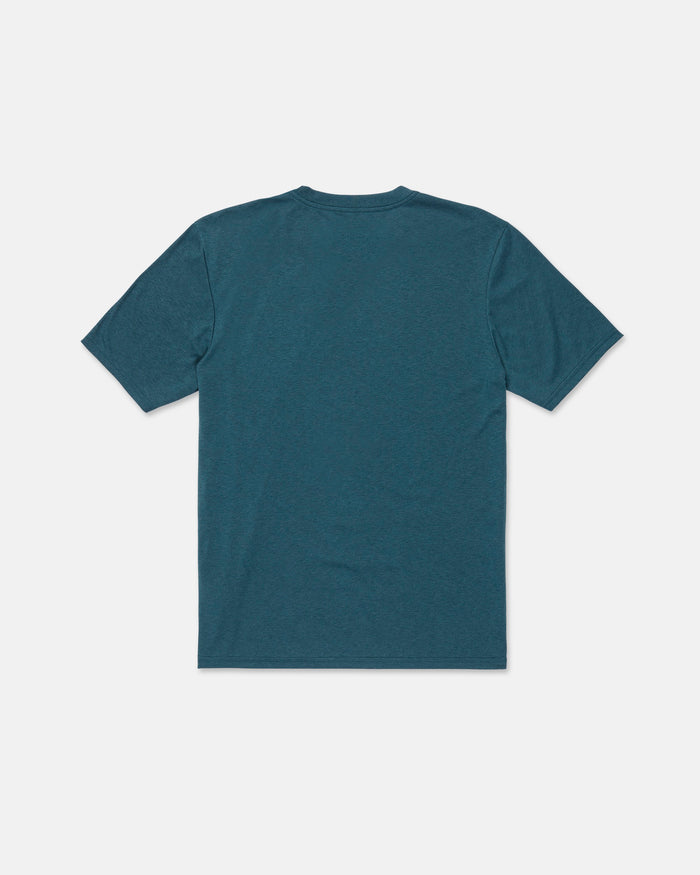 A Volcom Men's Stone Tech Short Sleeve Tee in teal, featuring a modern fit and plain, short sleeves, is laid flat with the back side facing up against a white background.