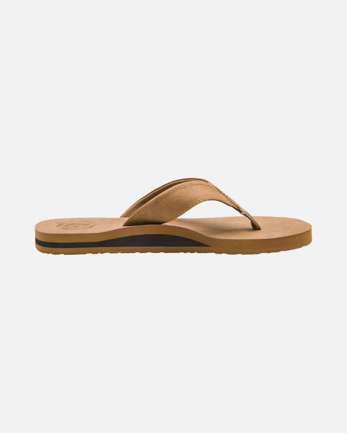 A single Volcom Men’s Victor Sandals LX sandal features a thick fabric strap and flat brown sole with signature Recliner Comfort Foam, displayed on a plain white background.