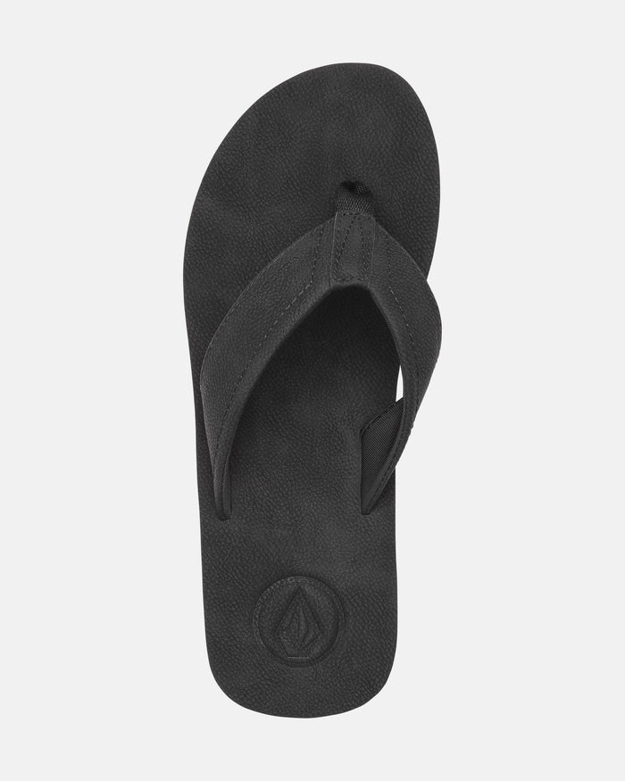 The Volcom Men's Victor Sandals LX feature a black design, Recliner Comfort Foam textured footbed, wide fabric thong strap, and a circular heel logo—perfect water-friendly sandals for all-day comfort.