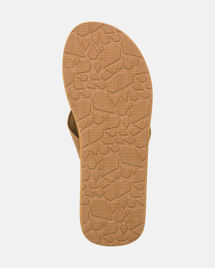 A brown Volcom Men's Victor LX Sandal viewed from the bottom on a white background, showing its textured geometric sole—water-friendly footwear perfect for any adventure.