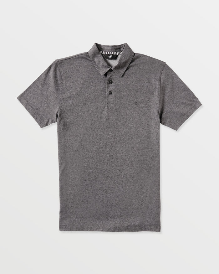 The Volcom Men's Wowzer Polo Short Sleeve Shirt features a classic collar and three black buttons in plain gray, offering a modern fit perfect for business casual style.