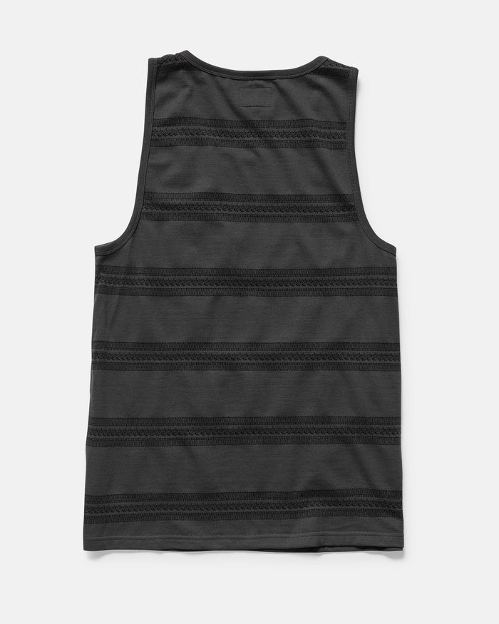 The Volcom Men's Yewster Tank is a sleeveless black top featuring dark gray jacquard stripes, shown flat from the back on a white background. Made from 240gsm cotton with a modern fit.