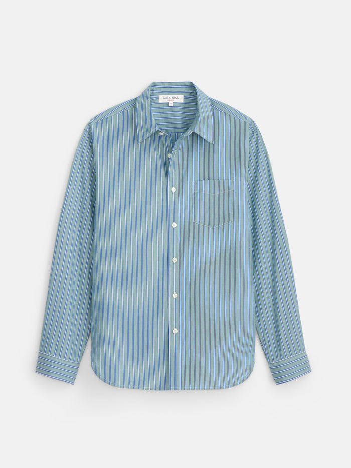 Introducing the Mill Dress Shirt In End-on-End Stripe—a long-sleeve, button-down shirt featuring a blue base with thin vertical stripes in white, yellow, and green. Made from 100% cotton, this refined shirt includes a classic collar and a single chest pocket for timeless style.