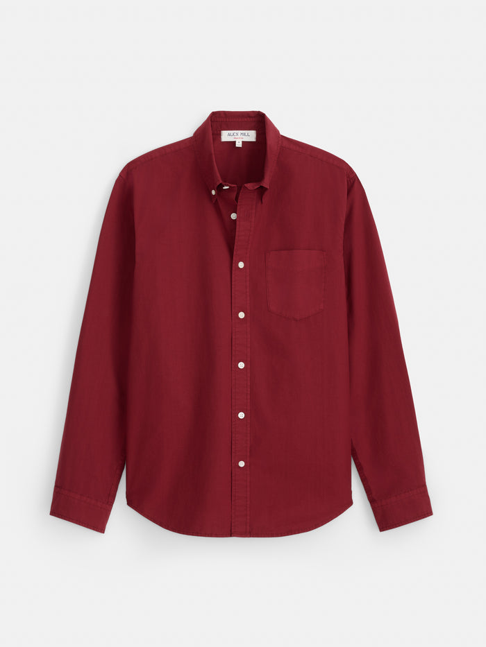 Mill Shirt in Cotton Poplin—men’s long-sleeve maroon button-down featuring a single chest pocket, crafted from 100% cotton for comfort and style, laid flat on a white background.