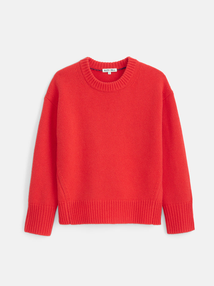 The Nottinghill Sweater in Wool, shown laid flat on a white background, features a bright red color, long sleeves, an oversized fit, a crew neck, and ribbed cuffs, hem, and collar.