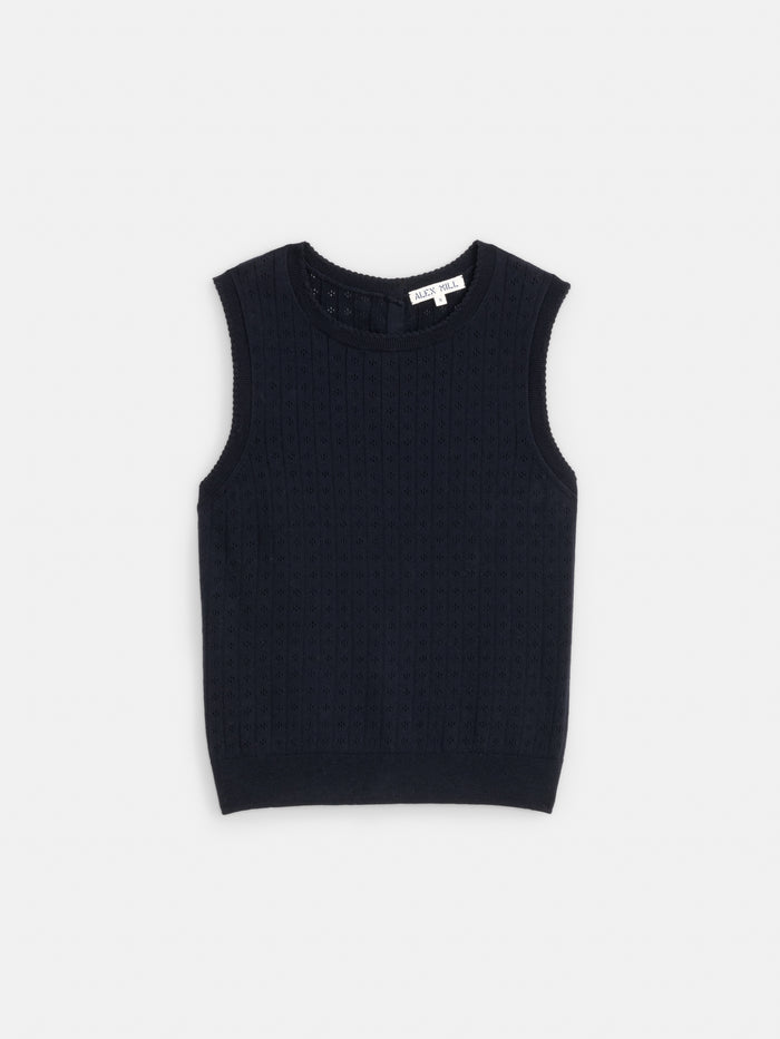 The Odette Sweater Tank in cotton cashmere, a sleeveless black textured knit vest, is displayed laid flat on a white background.