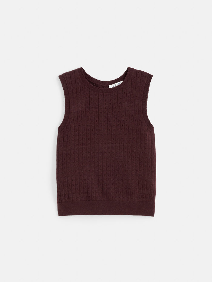 Odette Sweater Tank in Cotton Cashmere—a sleeveless, maroon, knitted vest featuring a subtle textured pattern and a feminine fit, crafted from a luxurious cotton-cashmere blend and displayed against a white background.