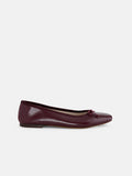 The Prince Street Ballet Flat in Leather, shown in maroon Italian leather with a small bow on the toe, is displayed from the side against a plain white background.