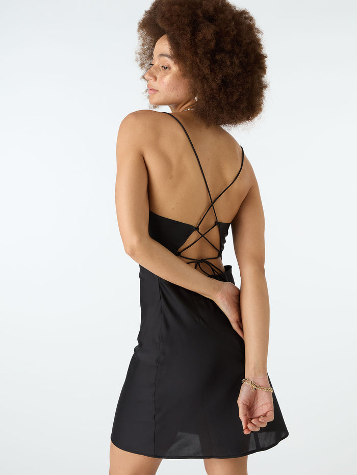 Black strappy mini dress with crossover tie back
