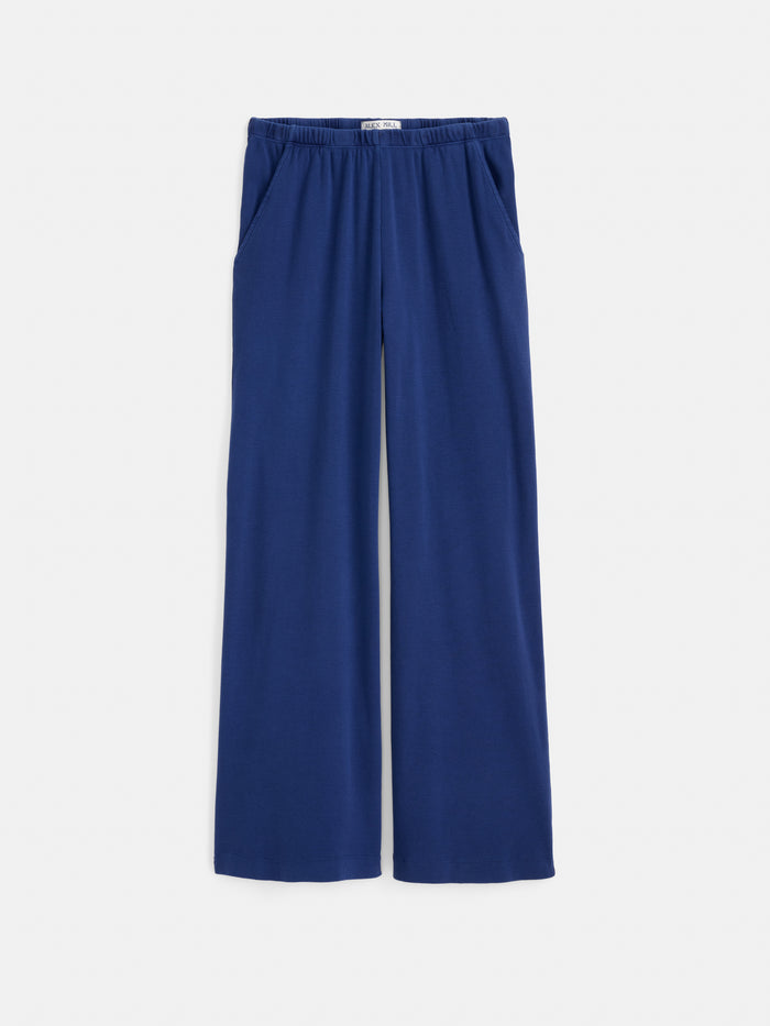 Scout Pull On Pant in Cotton Rib: Wide-leg blue pants featuring a comfortable elastic waistband and practical side pockets, made from 100% cotton rib. Shown laid flat on a white background.