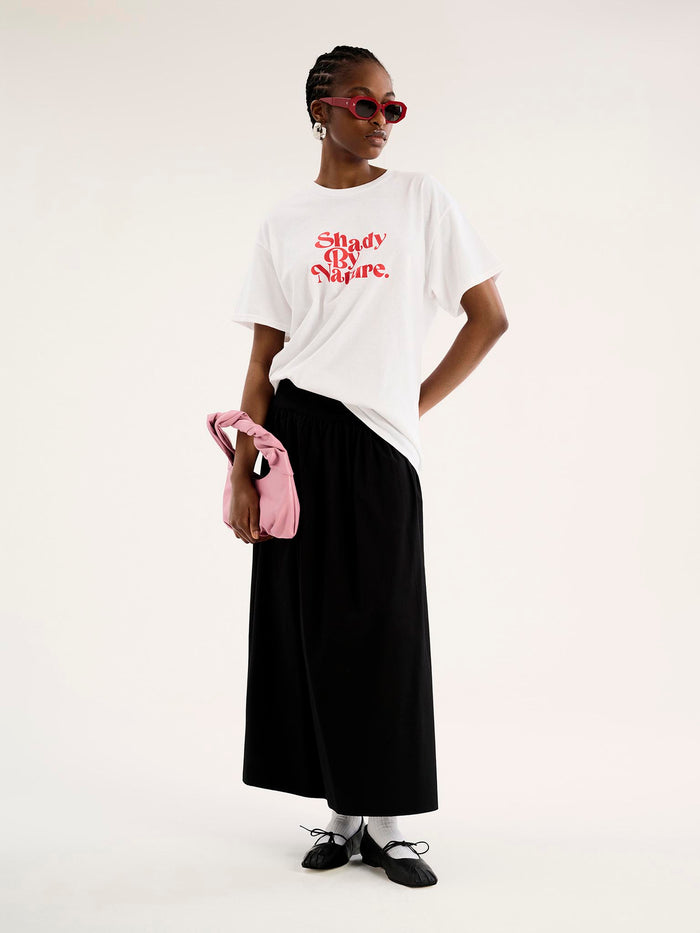 white short sleeved t-shirt with red text saying shady by nature
