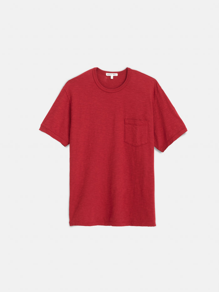 The Standard Pocket Tee in Slub Cotton, shown in plain red against a white background, features a round neckline and a single chest pocket. Crafted in LA from breathable slub cotton, this t-shirt offers everyday comfort and effortless style.