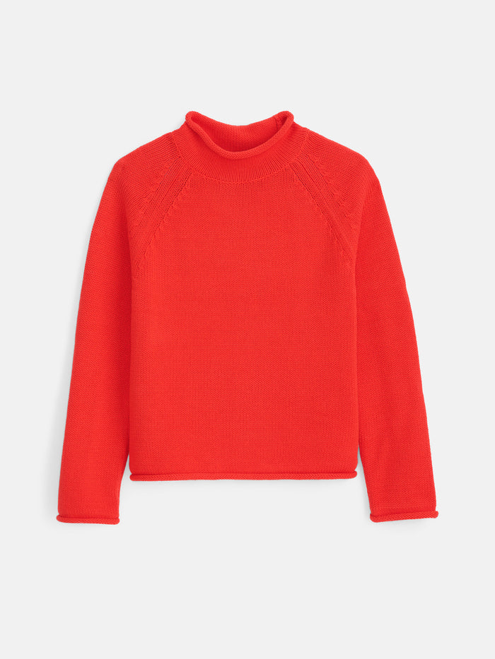 The Eastport Rollneck In Cotton in bright red, a long-sleeve 100% cotton sweater with a mock neck, is shown laid flat on a white background. The soft, slightly thick fabric makes it ideal for cooler weather. The design is clean with no visible patterns or decorations.