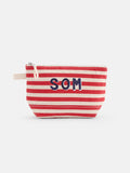 The Perfect Canvas Pouch in Stripe is a small pouch with red and white horizontal stripes, bold SOM letters on the front, and a beige fabric loop on the left side.