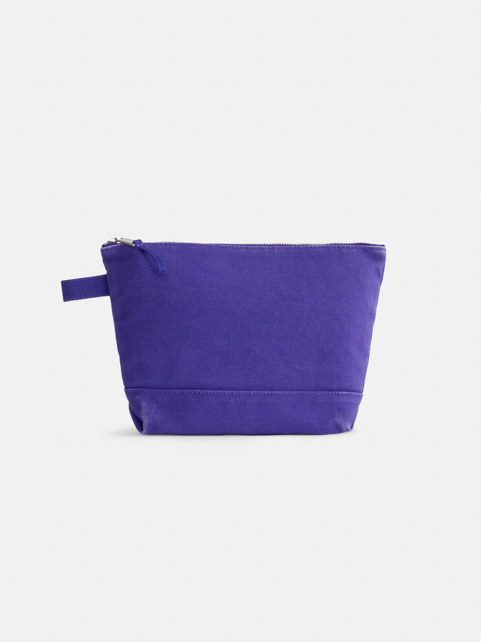 The Painted Perfect Canvas Pouch is a purple zippered canvas bag featuring a convenient side loop, displayed against a plain white background—ideal for use as a personalized pouch or makeup bag.