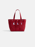 The Perfect Weekday Tote: a red cotton bag with two handles and white and blue "E L I" letters on the front, shown against a plain white background—a stylish monogrammable tote for everyday use.
