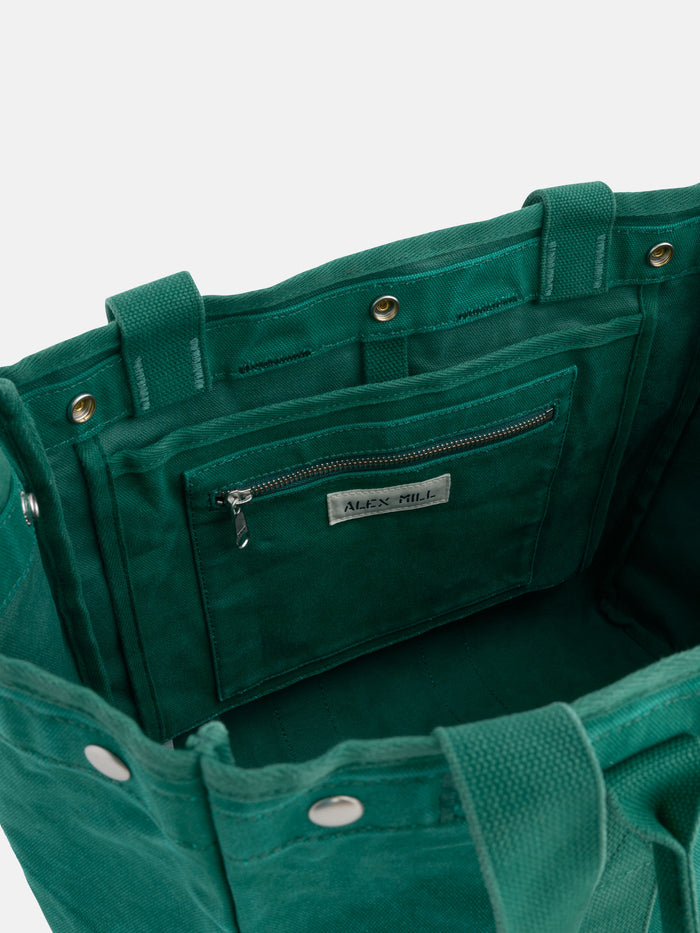 The Perfect Weekday Tote is a green cotton bag with a zipper, perfect for everyday use and can be monogrammed.