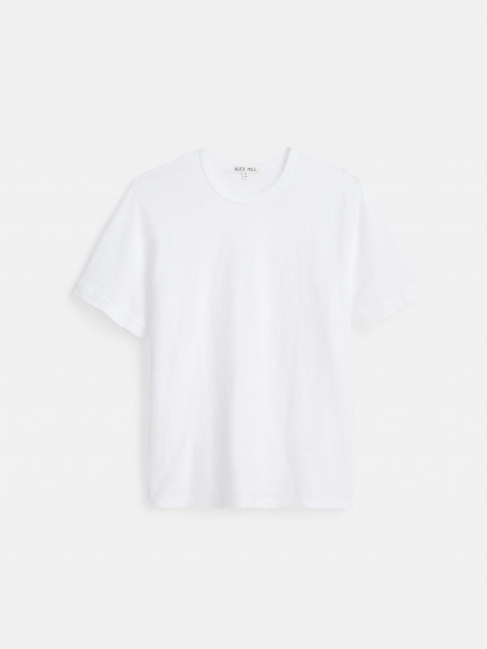 The Standard T-Shirt In Slub Cotton, a men’s short-sleeve crew neck tee crafted from breathable slub cotton, is displayed against a white background.