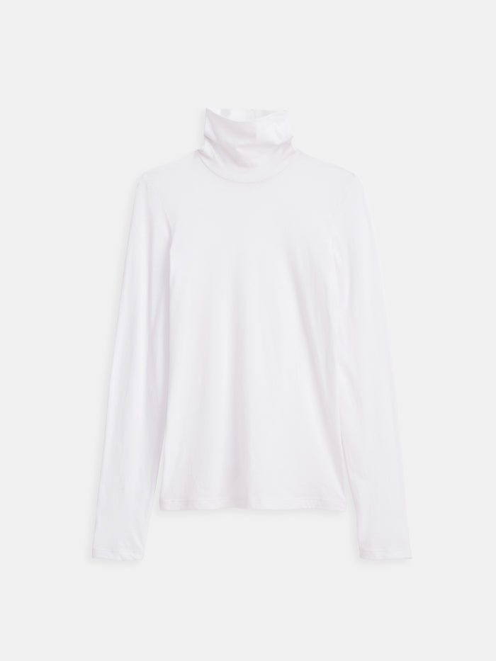 The Tissue Turtleneck In Cotton, a plain white long-sleeve tee, is laid flat on a white background—perfect for layering.
