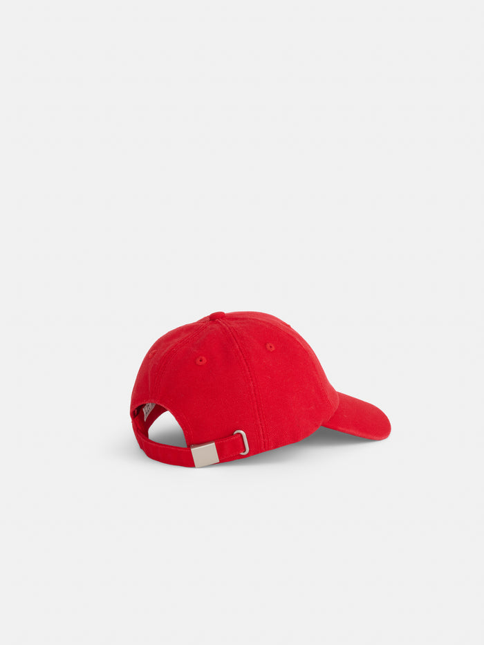 The Washed Canvas Baseball Cap is displayed from the back, highlighting its adjustable strap with a metal clasp against a plain white background.