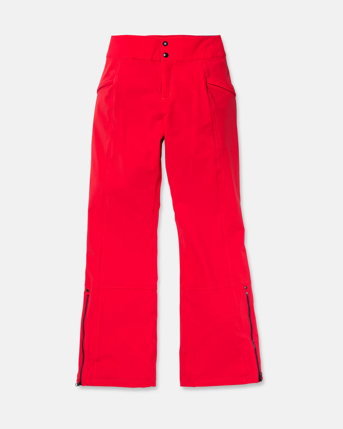 Volcom Women’s Alpine All Day Insulated Pants in bright red, featuring a high-rise fit, front zipper and snap closure, side pockets, and zippered openings at the bottom of each pant leg. Constructed with 4-way ultra stretch fabric for comfort and mobility, these pants are displayed flat on a white background.