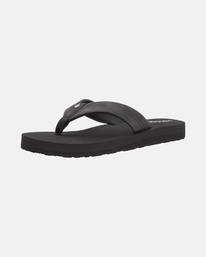 The Volcom Women's Boyfriends Thong is a black sandal flip-flop with wide fabric straps, a textured sole, and a comfort foam footbed, shown on a white background.