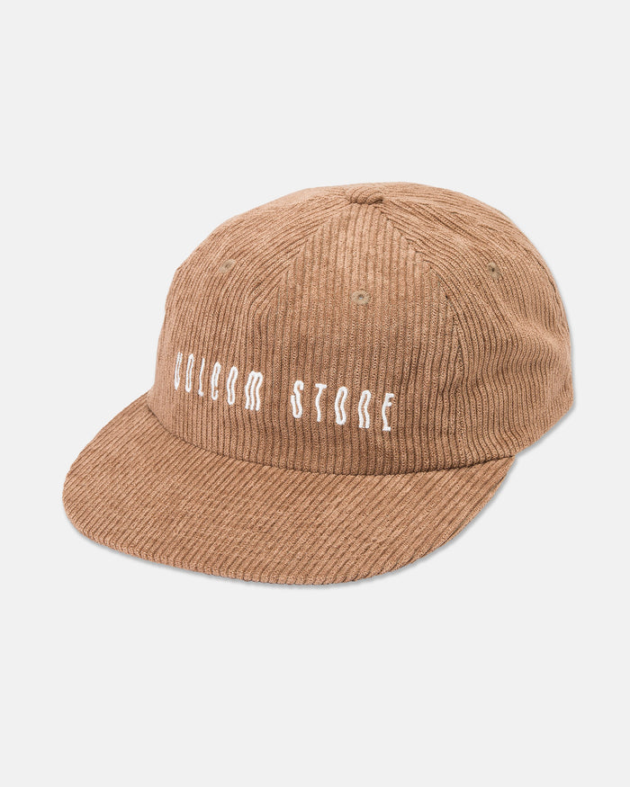 A brown cotton corduroy Women's Full Stone Dad Hat by Volcom, featuring "WELCOM STORE" embroidered in white on the front, shown against a plain white background.