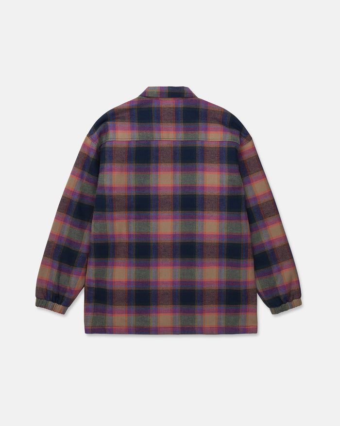 Back view of the Volcom Women’s Insulated Riding Flannel Jacket, featuring a long-sleeve plaid design in shades of purple, green, pink, and yellow. This jacket includes a collar, elastic cuffs, and is thoughtfully finished with a soft taffeta lining for added comfort.