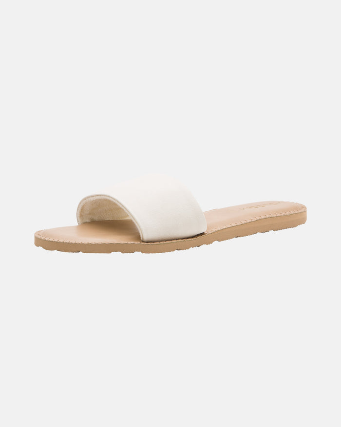 The Volcom Women's Simple Slide is a minimalist sandal with a wide white strap and flat light tan sole, shown on a plain white background.