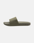 The Volcom Women's Volcation Slides feature an olive green wide strap and flat sole for everyday comfort, shown against a plain white background.