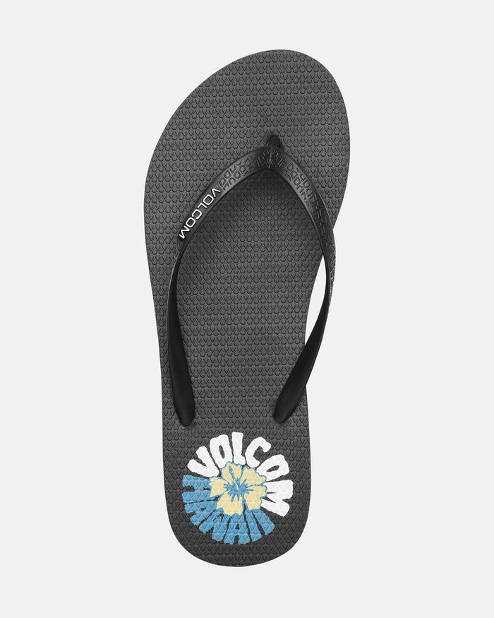 The Women's Volcomotion Wos Hawaii flip-flop by Volcom is black with a textured sole, featuring the Volcom logo in white and blue and a yellow sunburst design near the heel.